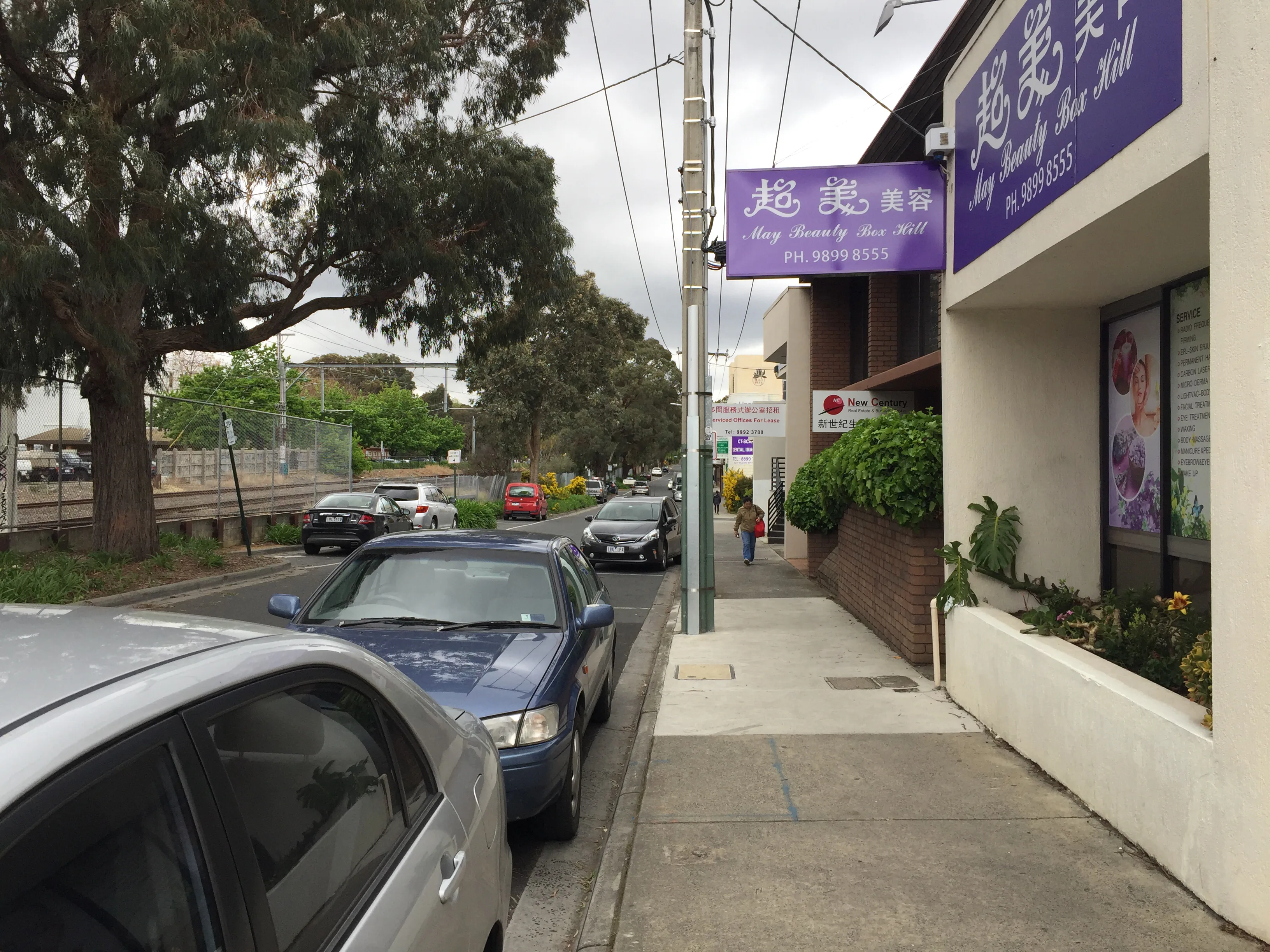 Rutland Road streetscape with May Beauty Box Hill purple fascia visible at right